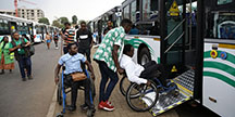 Boarding a bus with a wheelchair. Photo