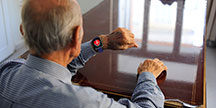 A person using a smart watch. Photo
